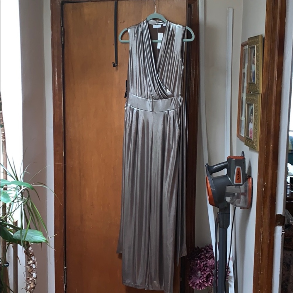 Silver jumpsuit with tie around waist